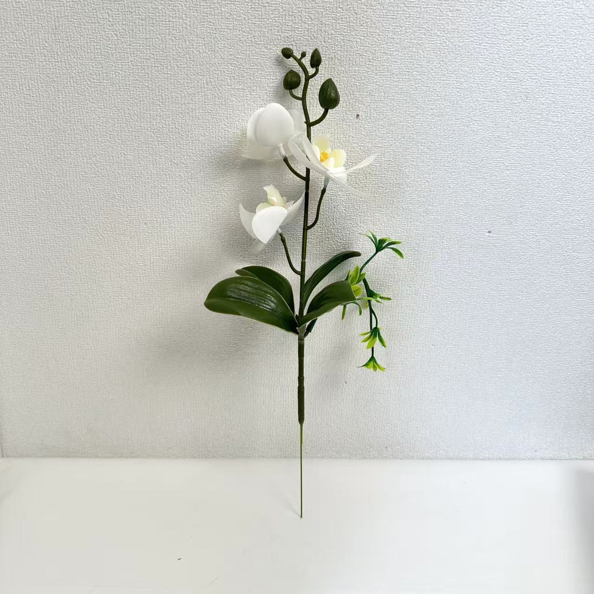 Naturgetreues Orchideenarrangement
