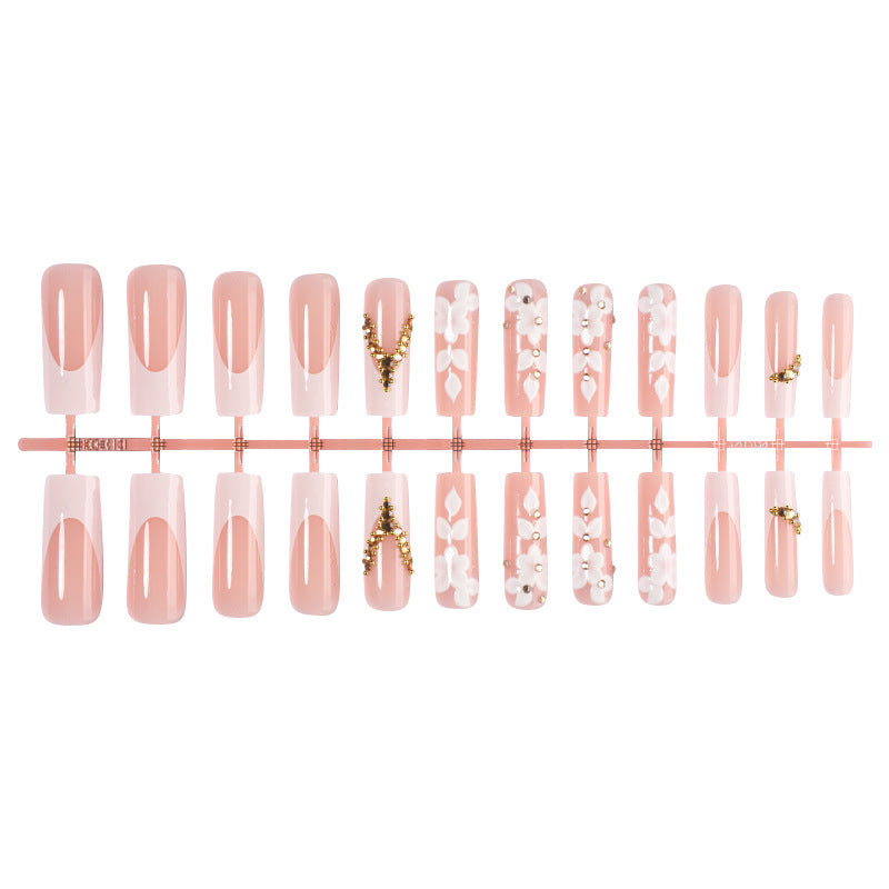 Kunstnagelset mit raffinierten Blüten- und Glitzerelementen Brehn