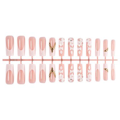 Kunstnagelset mit raffinierten Blüten- und Glitzerelementen Brehn