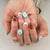 Künstliche Nagelkunst mit floralen und geometrischen Elementen Brehn