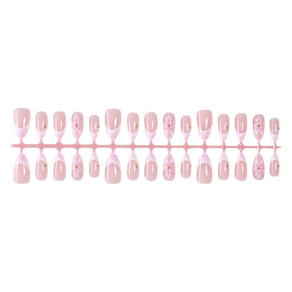 Kunstnagelset mit romantischen Blüten und eleganten Designakzenten Brehn