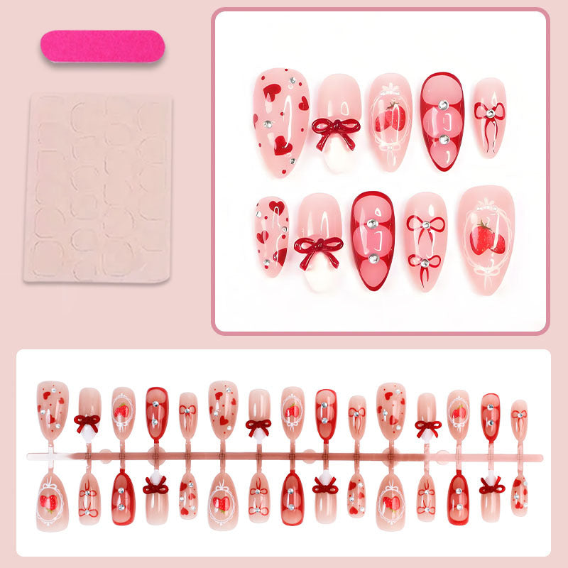 Kunstnagelset mit niedlichen Herz- und Schleifenmotiven Brehn