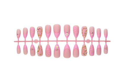 Kunstnagelset mit eleganten Blüten- und Glitzerverzierungen Brehn