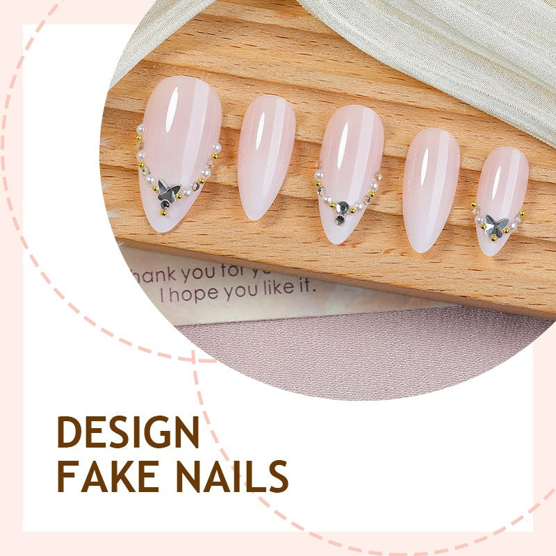 Kunstnagelset mit eleganten Strassverzierungen und glamourösen Designs Brehn