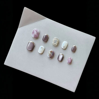 Künstlerisches Press-On Nagelkunst Set mit einzigartigen Ombre- und metallischen Akzenten