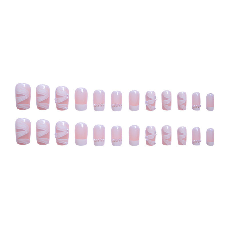 Elegantes Kunstnagelset mit stilvollem Wellenmuster und Perlenakzenten Brehn