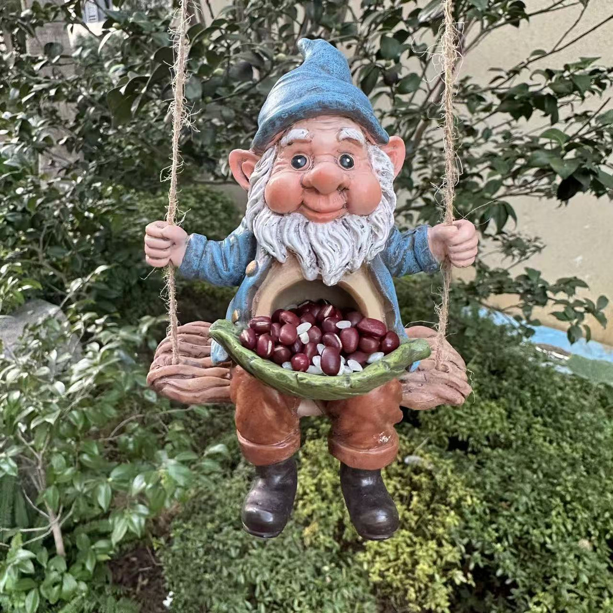 Gartenwichtel auf Schaukel Brehn