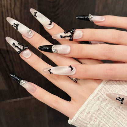 Künstlerisches Stiletto Press-On Nagelkunstset mit Steinakzenten