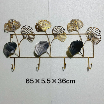 Dekorativer Metall Wandhakenregal mit Ginkgo-Blatt-Design Brehn