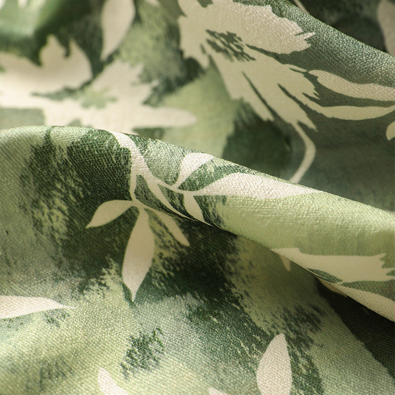 Dekorativer Kurzflor-Teppich mit gewelltem Rand und floralem Aquarellmuster Brehn