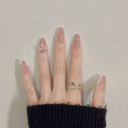 Dekoratives Nagelkunst Press-On Set mit Glitzerakzenten