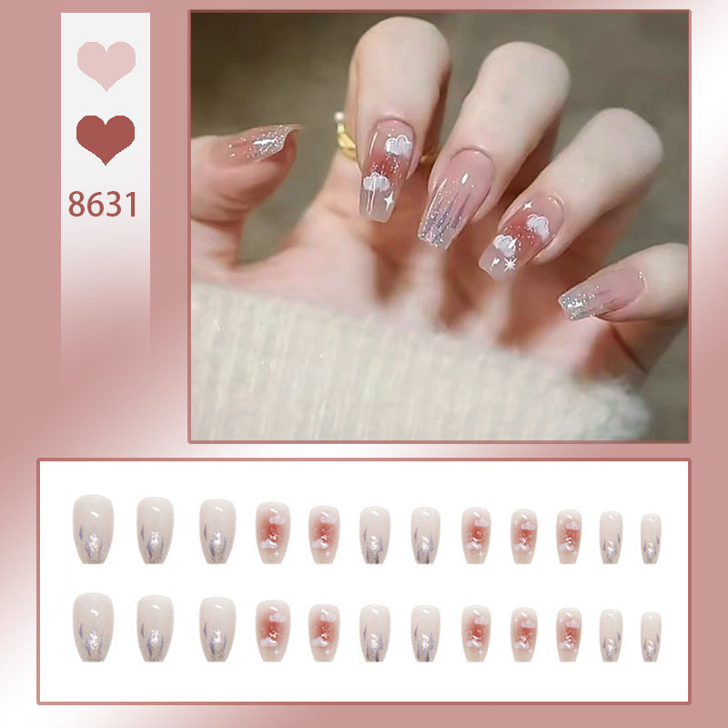 Kunstnagelset mit floralem Design und Glitzerakzenten Brehn