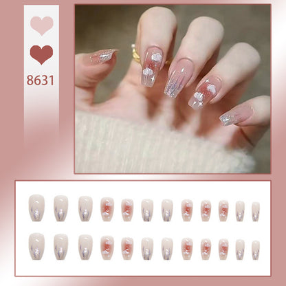 Kunstnagelset mit floralem Design und Glitzerakzenten Brehn
