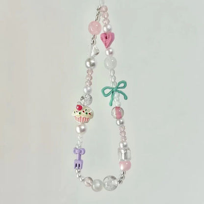 Verspielter Perlen Smartphone Charm Halter Brehn