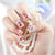 Künstlerisches Press-On-Nagelset mit fantasievollen Designs Brehn