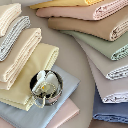 Feines Baumwollsatin-Bettlaken- und Kissenbezugs-Set mit glattem Fall und hochwertiger Webung