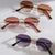Damen modische Sonnenbrille mit hochwertigem Metallrahmen und eleganten Gläsern Brehn