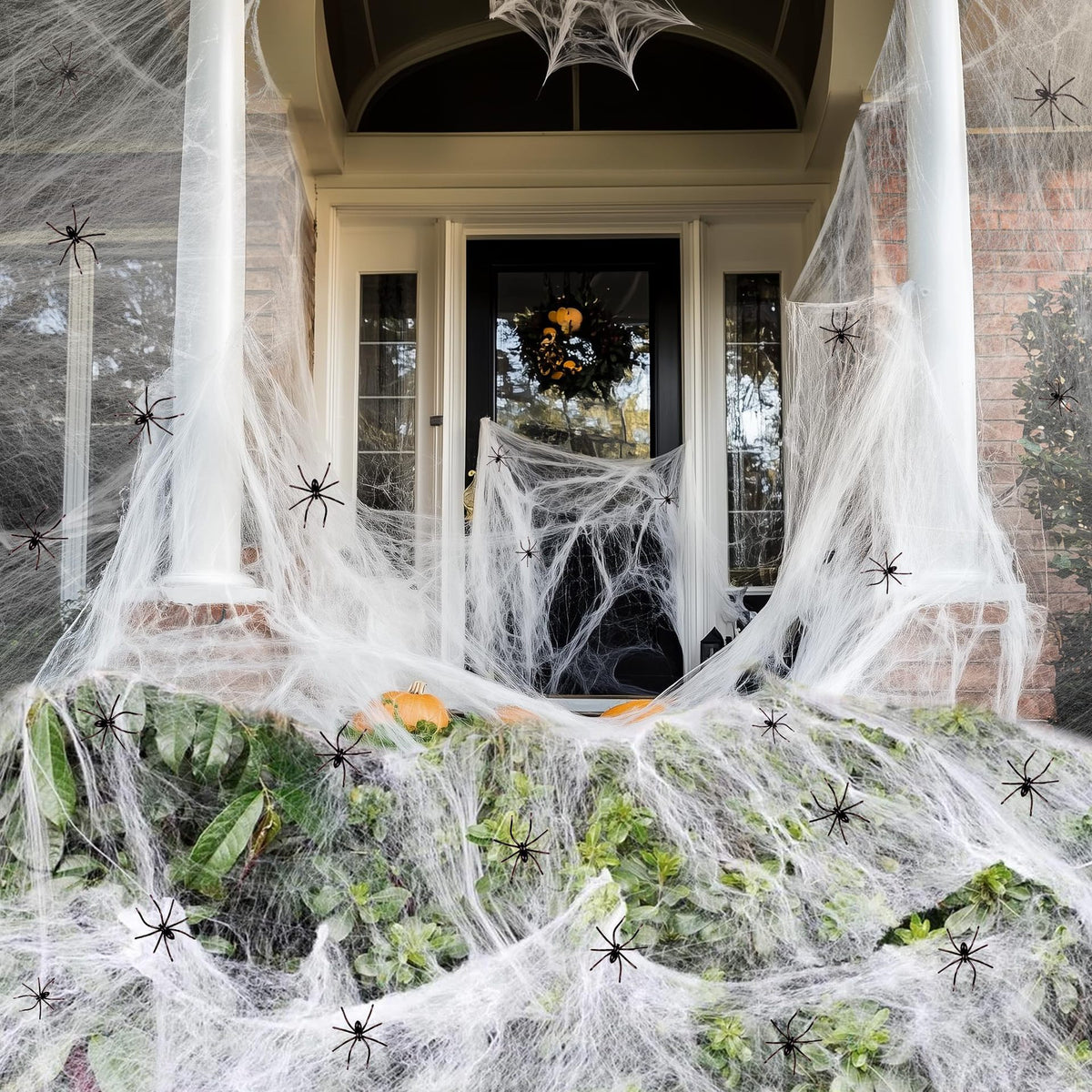 Halloween-Dekorationsset mit dehnbaren künstlichen Spinnweben und Deko-Spinnen