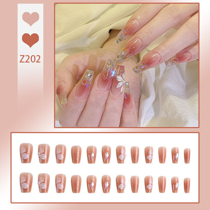 Kunstnagelset mit floralen und glitzernden Akzenten Brehn