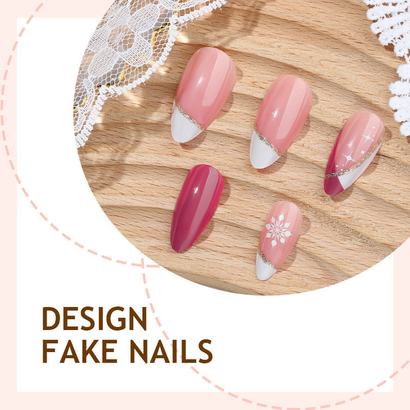 Kunstnagelset mit dekorativen Blütenmotiven und elegantem Ombre-Effekt Brehn