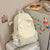 Niedlicher Flügeldesign Schulrucksack