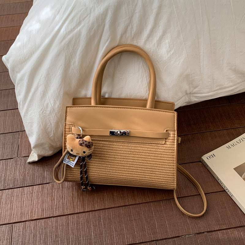 Elegante gewebte Handtasche mit abnehmbarem Schulterriemen