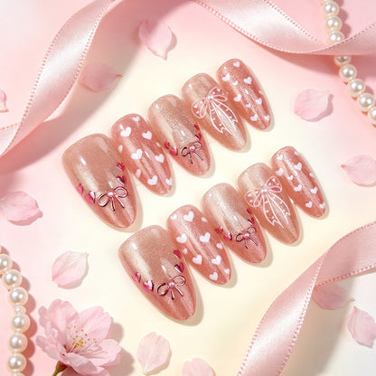 Dekoratives Press-On Nagelkunst Set mit Herz- und Schleifen-Designs