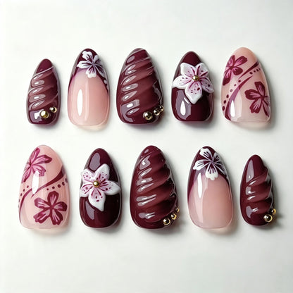 Künstlerisches Press-On Nagelkunst Set mit blumigen und glänzenden Designs Brehn