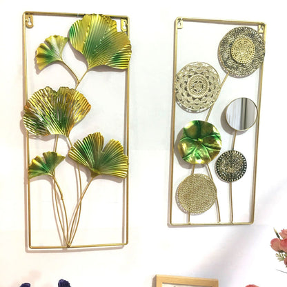 Dekorative Metallwandkunst mit tropischem Blatt- und Spiegeldesign Brehn