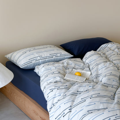 Bettwäsche-Set aus Baumwollperkal mit dezentem Streifen- und Pompon-Design