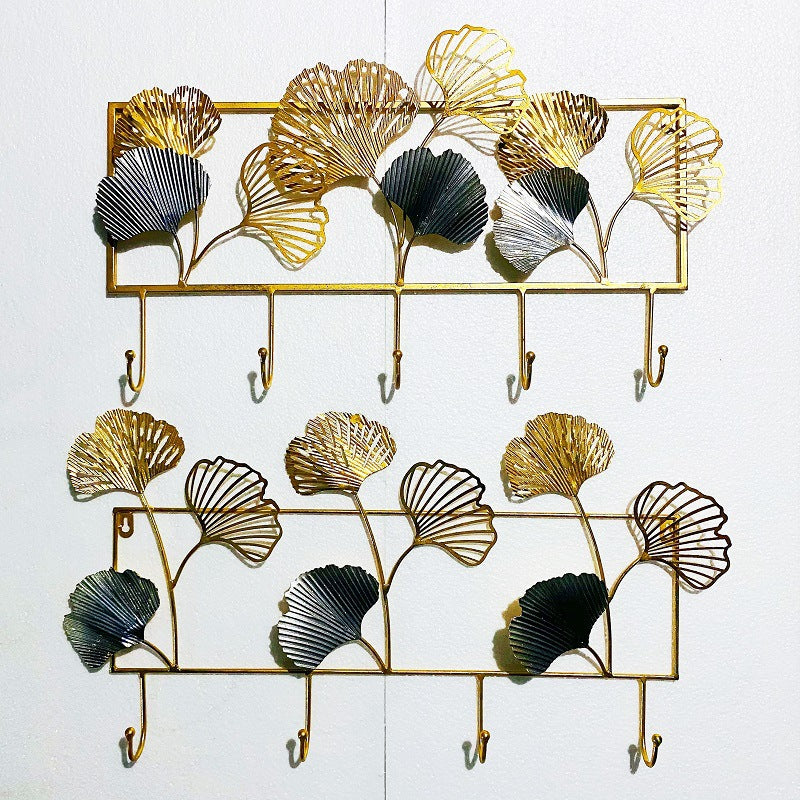 Dekorativer Metall Wandhakenregal mit Ginkgo-Blatt-Design Brehn