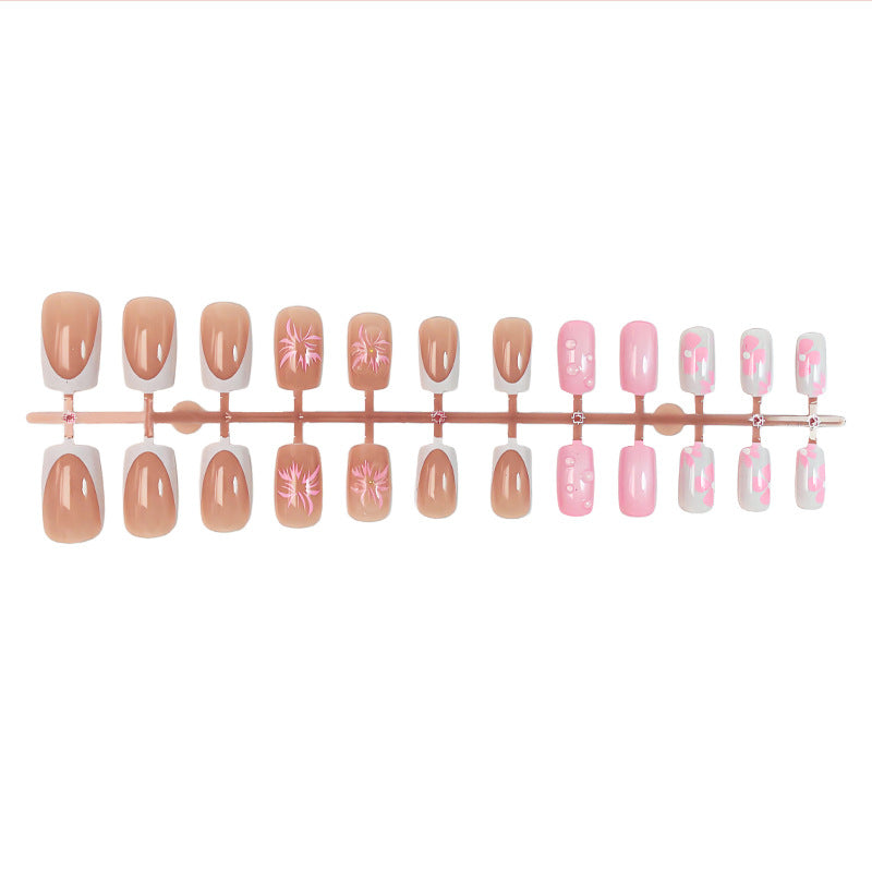 Kunstnagelset mit floralem und glamourösem Design Brehn
