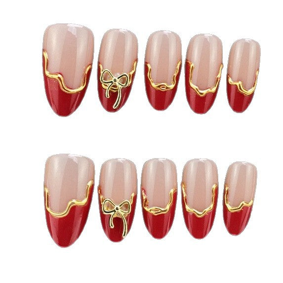 Kunstnagelset mit Blumen- und Golddetails Brehn