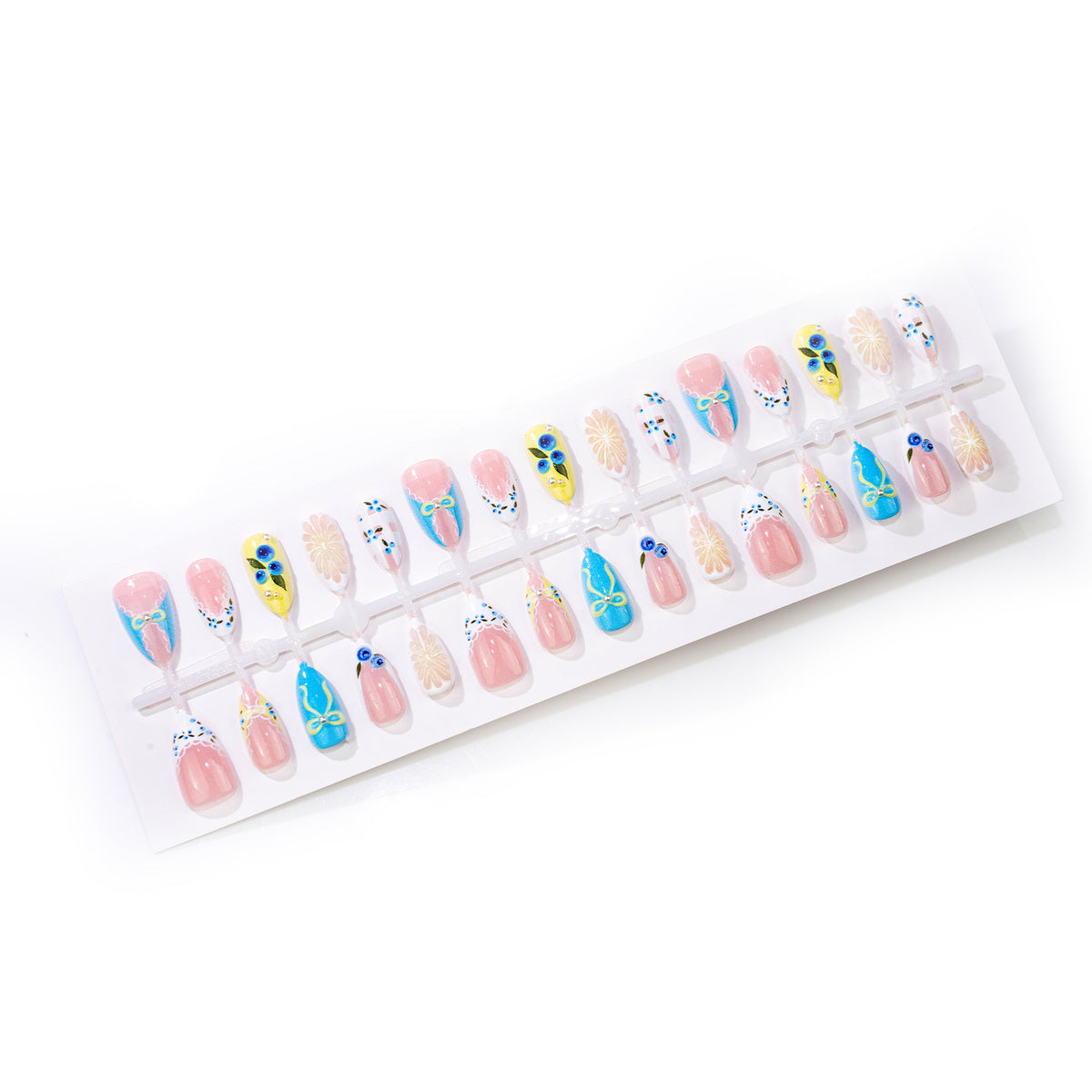 Künstlerisches Press-on-Nagelset mit floralen und Schleifenmustern Brehn