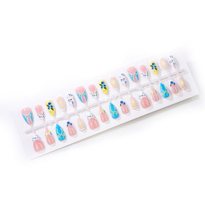 Künstlerisches Press-on-Nagelset mit floralen und Schleifenmustern Brehn