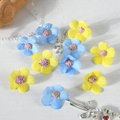 Glitzernde Blumen-Haaraccessoires