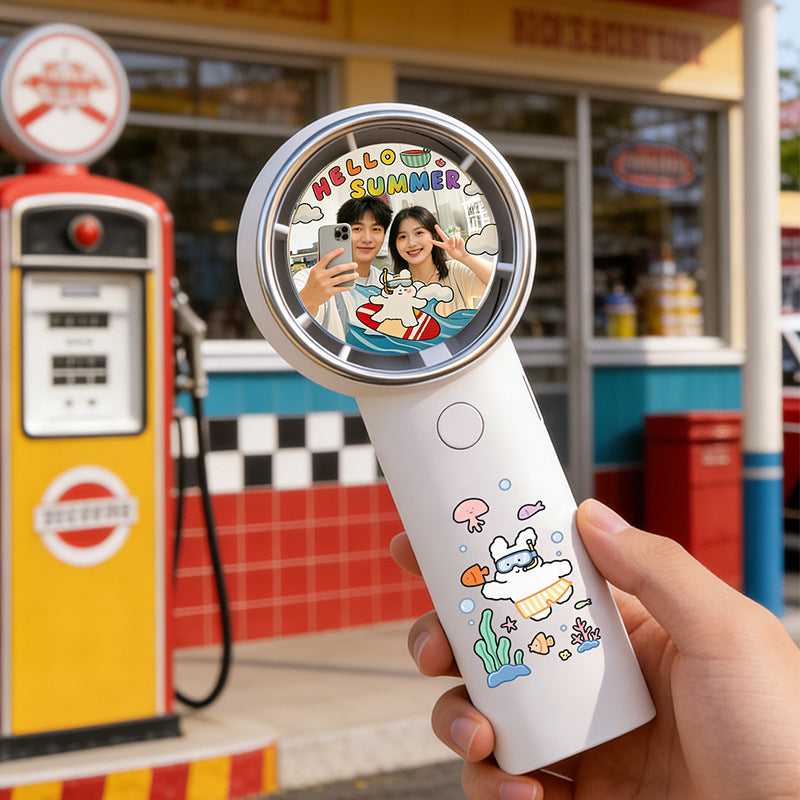 Tragbarer Handheld-Fan im Cartoon-Stil Brehn