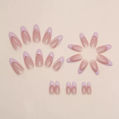 Elegante Kunstnagelspitzen mit Glitzer- und Perlverzierungen Brehn