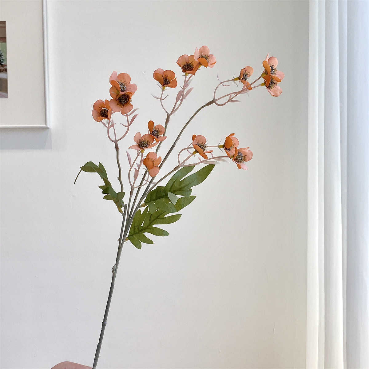 Dekorativer künstlicher Blumenzweig