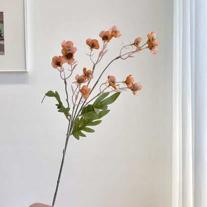 Dekorativer künstlicher Blumenzweig
