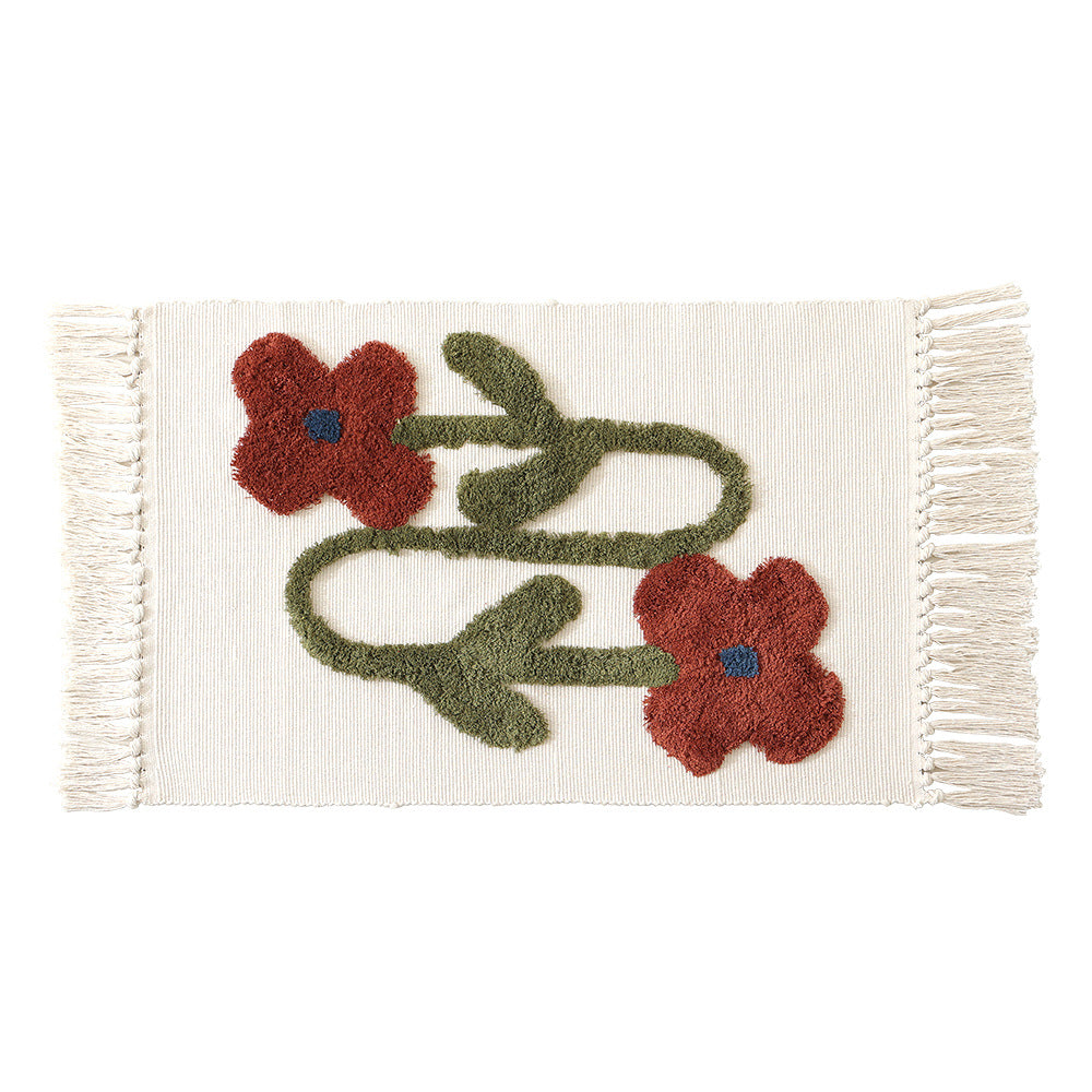 Handgewebter Baumwoll-Badmattenteppich mit Tufting-Blumenapplikation und Quasten Brehn