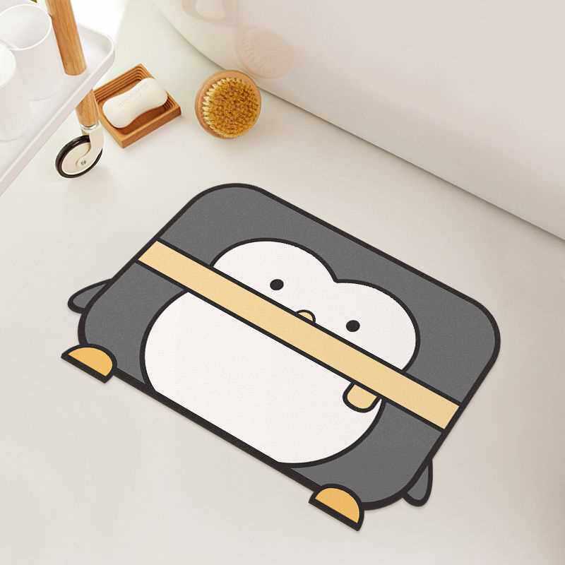 Verspielte Pinguin Badmatte