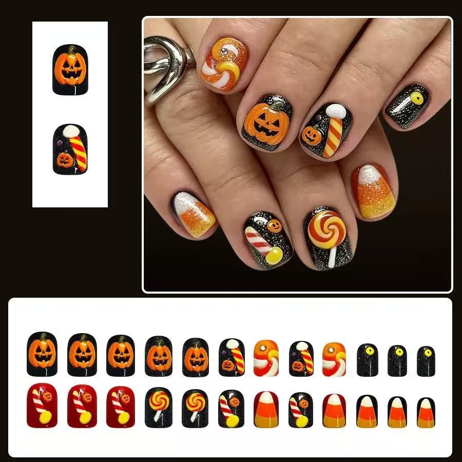 Halloween Kunstnagelset mit verspielten Kürbis- und Süßigkeitenmotiven Brehn