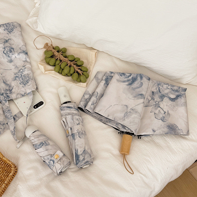 Damen Faltbarer Regenschirm mit floralen Motiven und Tragetasche Brehn