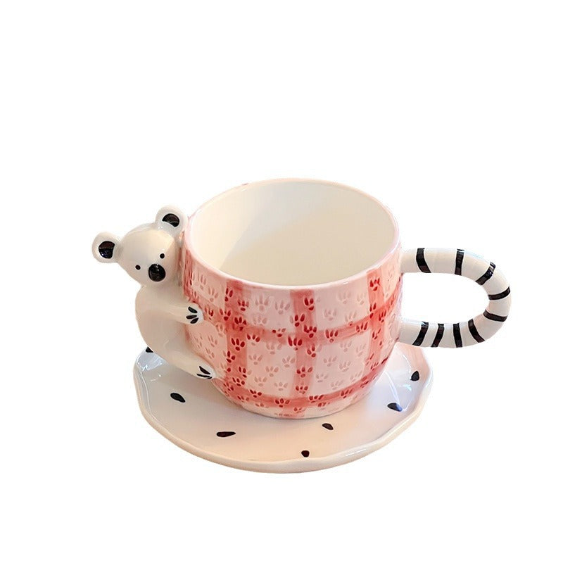 Verspieltes Keramik-Tassen-Set mit Koala-Reliefgriff und passender Untertasse