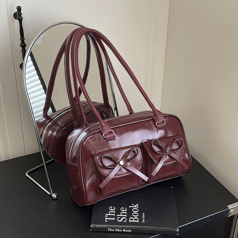 Stilvolle multifunktionale Handtasche mit Schleifendetail Brehn