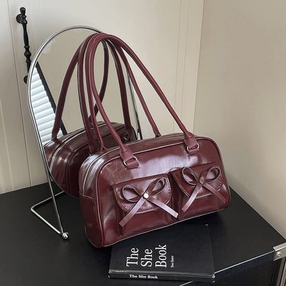Stilvolle multifunktionale Handtasche mit Schleifendetail Brehn
