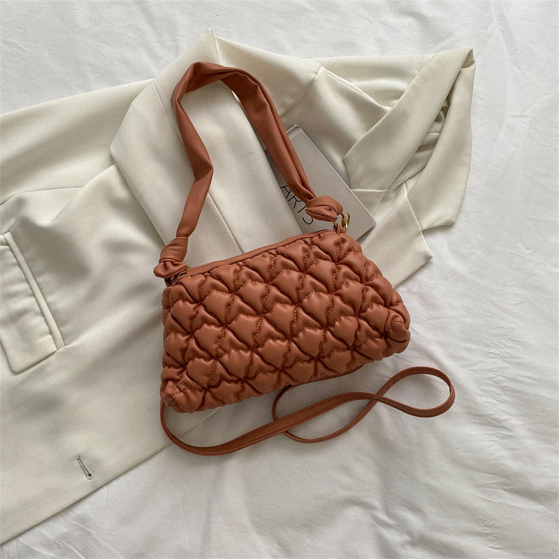 Elegante gepuffte Handtasche