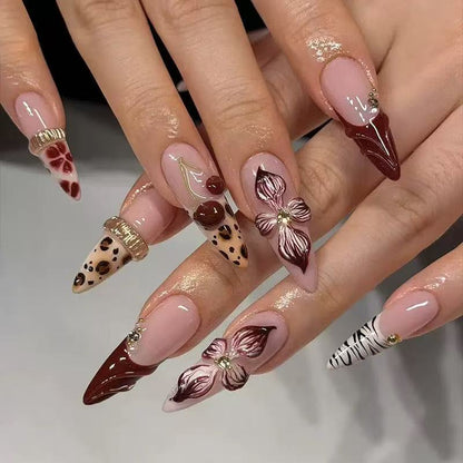 Elegantes Stiletto Press-On Nagelkunstset mit Blumen- und Tiermotiven Brehn