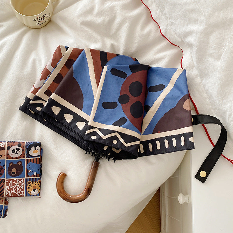 Damen Faltregenschirm mit kreativem geometrischem Design Brehn
